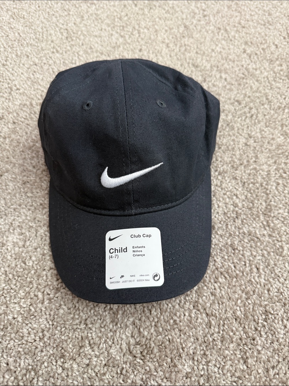 Nike Black Cap with White Swoosh Logo